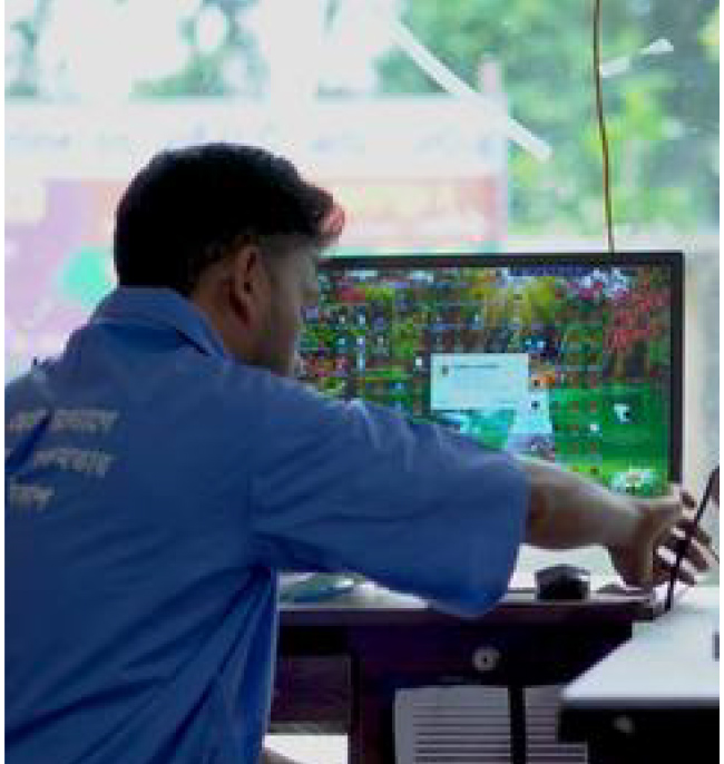 Robiul working at computer workstation